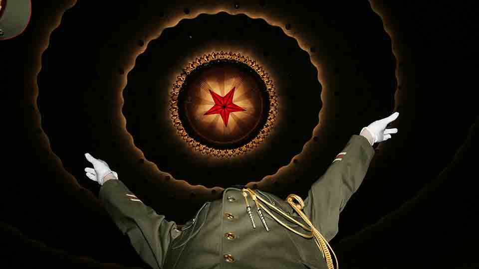 A Chinese military band conductor prepares to perform before the opening ceremony of the National People's Congress at the Great Hall of the People in Beijing March 5, 2007.